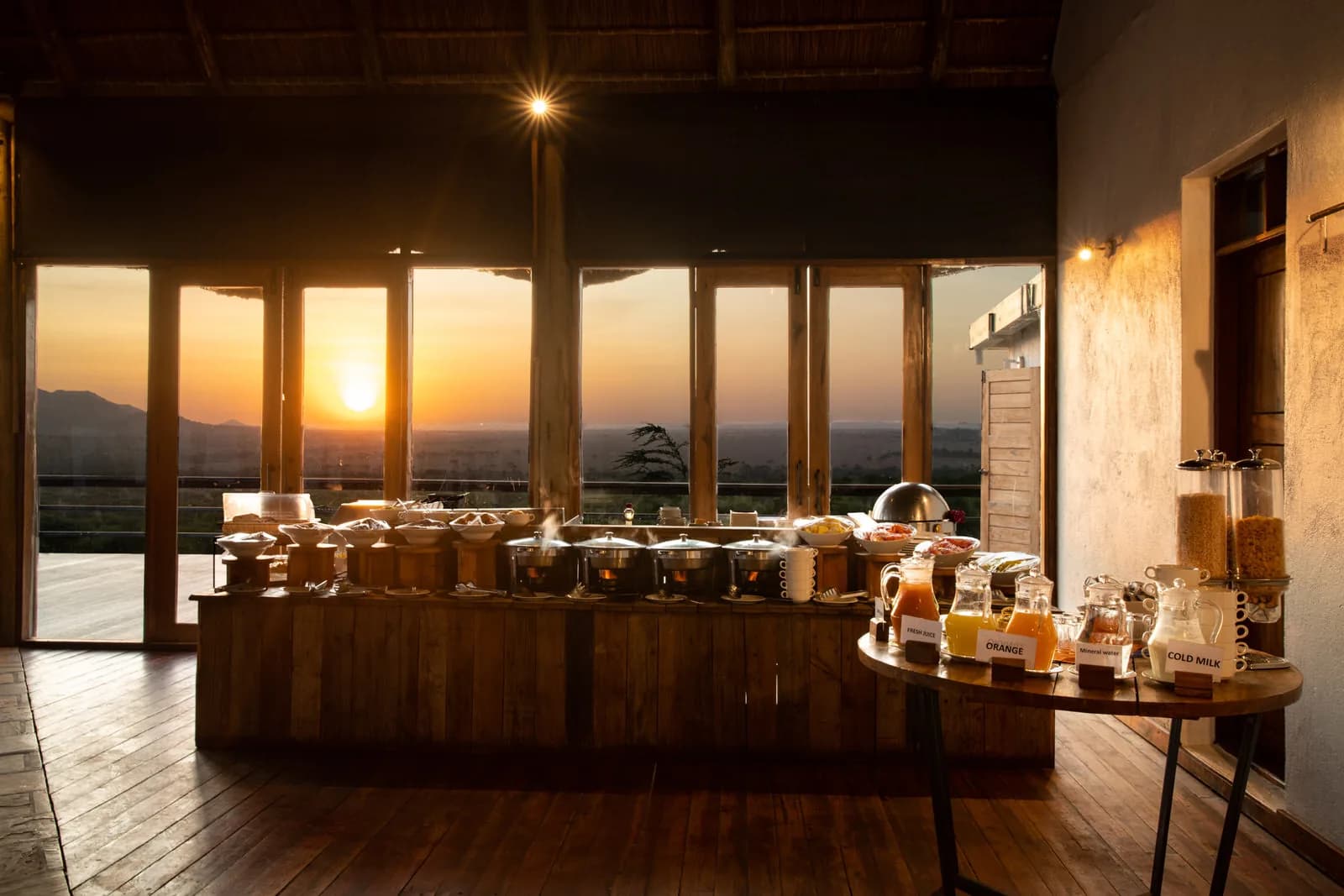 Breakfast buffet in the dining room, with the low sun through the windows